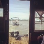 River Angels tow the stranded Shantyboat several miles to the mechanic