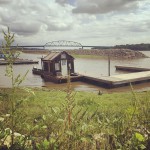 #Shantyboat chillin’ in Muscatine under dramatic skies.