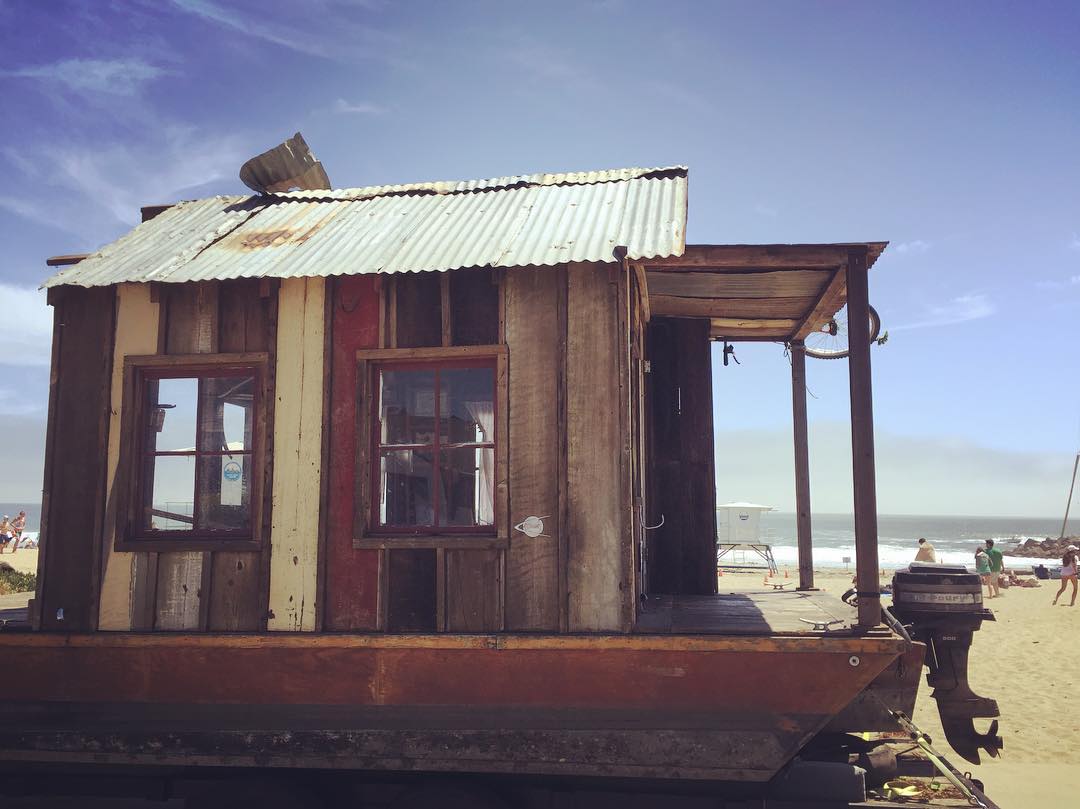 Shantyboat visits the harbor beach in Santa Cruz on the way to dry dock.