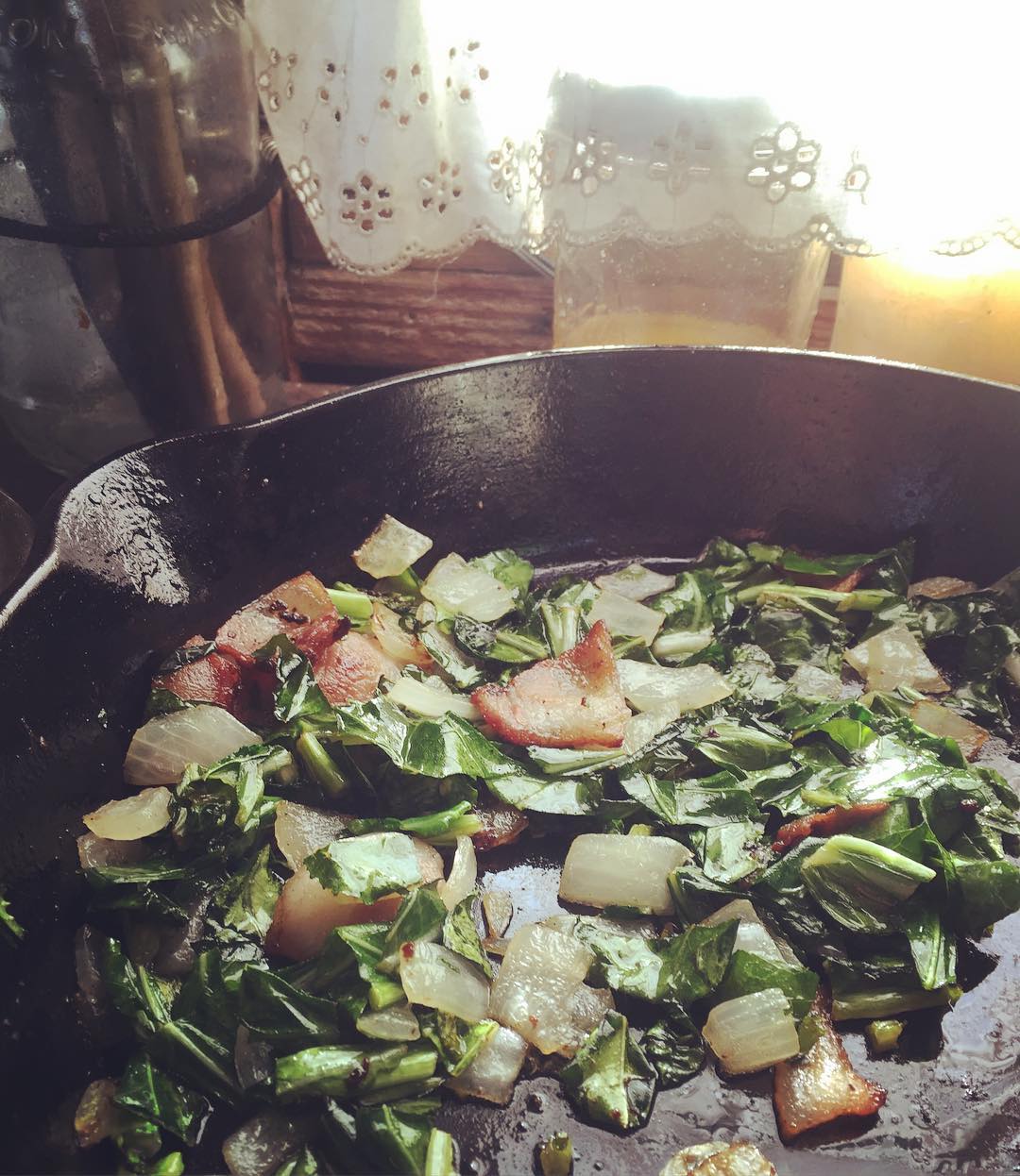 Collard greens and jawbone bacon for breakfast. Next up buttery grits and hush puppies