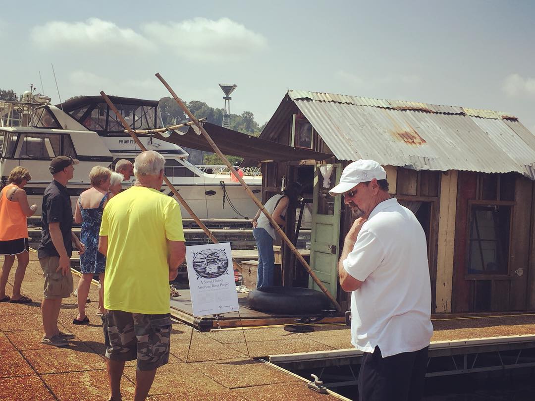 Visitors at the shantyboat open house