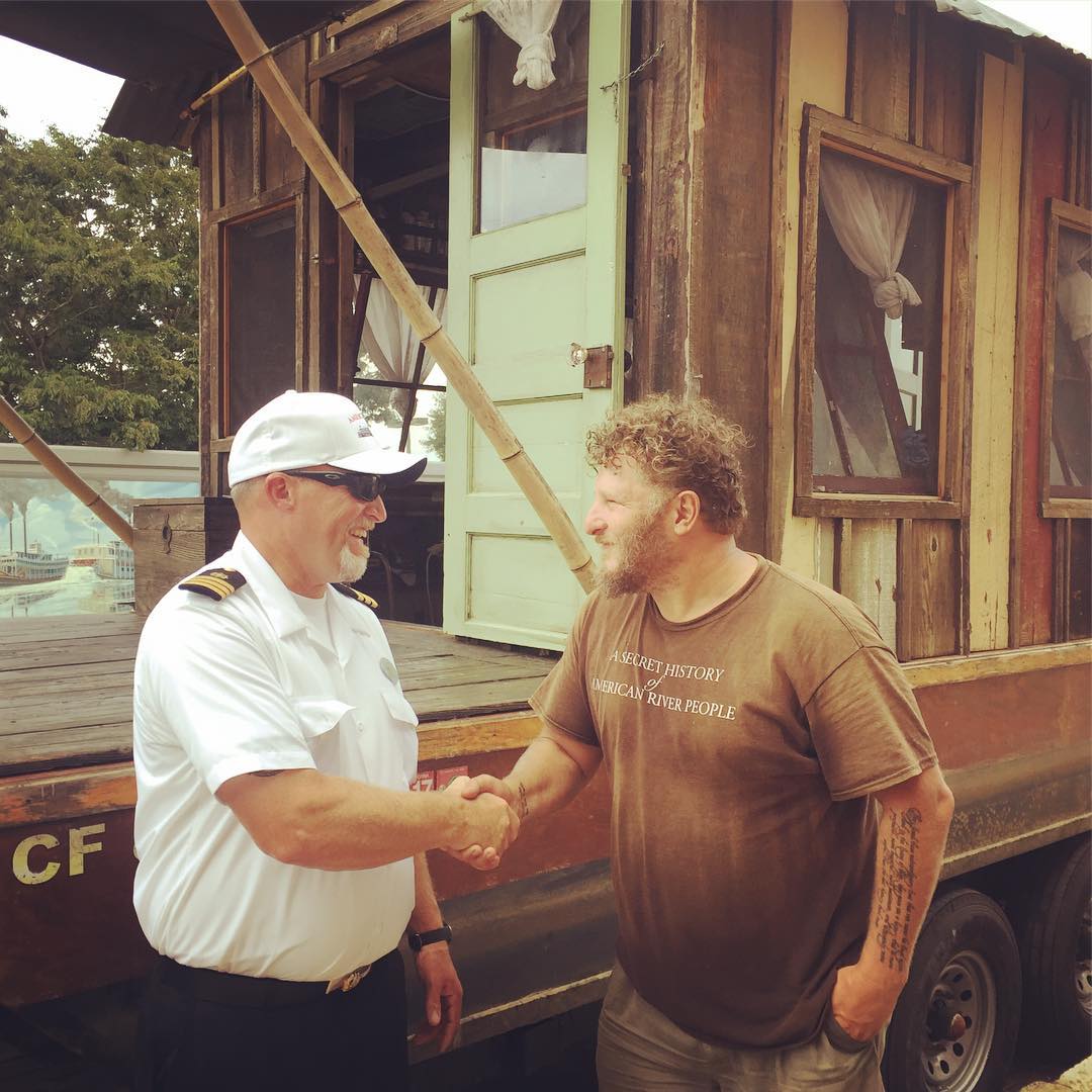 Capt Ron Gray Jr of the American Queen meets the captain of the Shantyboat Dotty