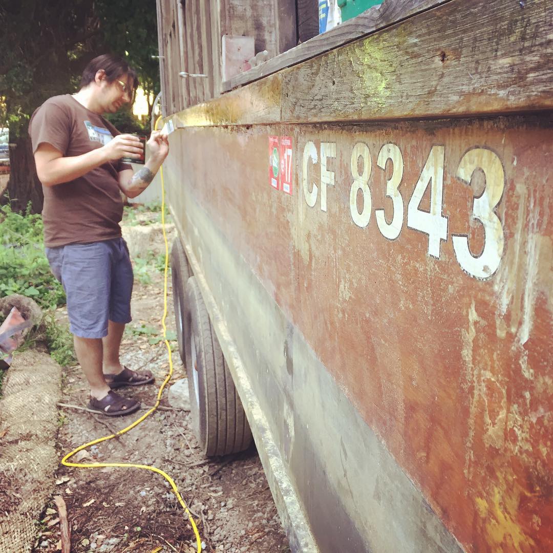 Miah revarnishes the battered rub rail