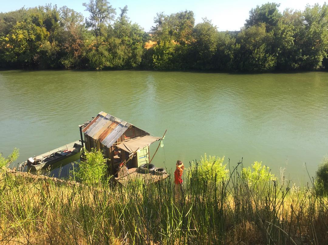 Shantyboat beached along Sutter Slough