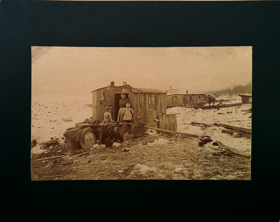 Vintage 1880s albumen photo of a young family living on a houseboat