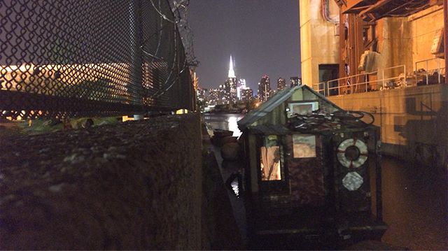 Shantyboat under the Pulaski Bridge. Empire State off the bow