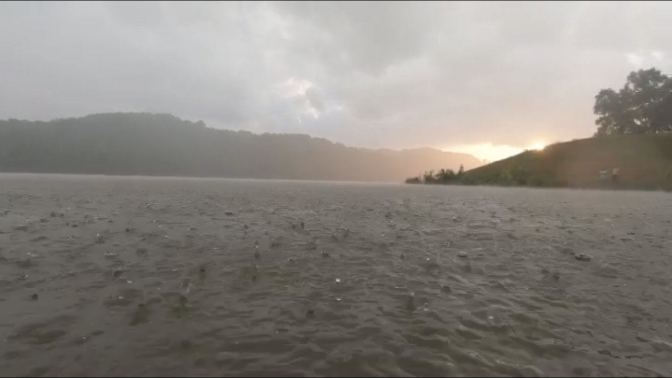 Swimming in a rain shower at the confluence of Sandy Creek and the Ohio