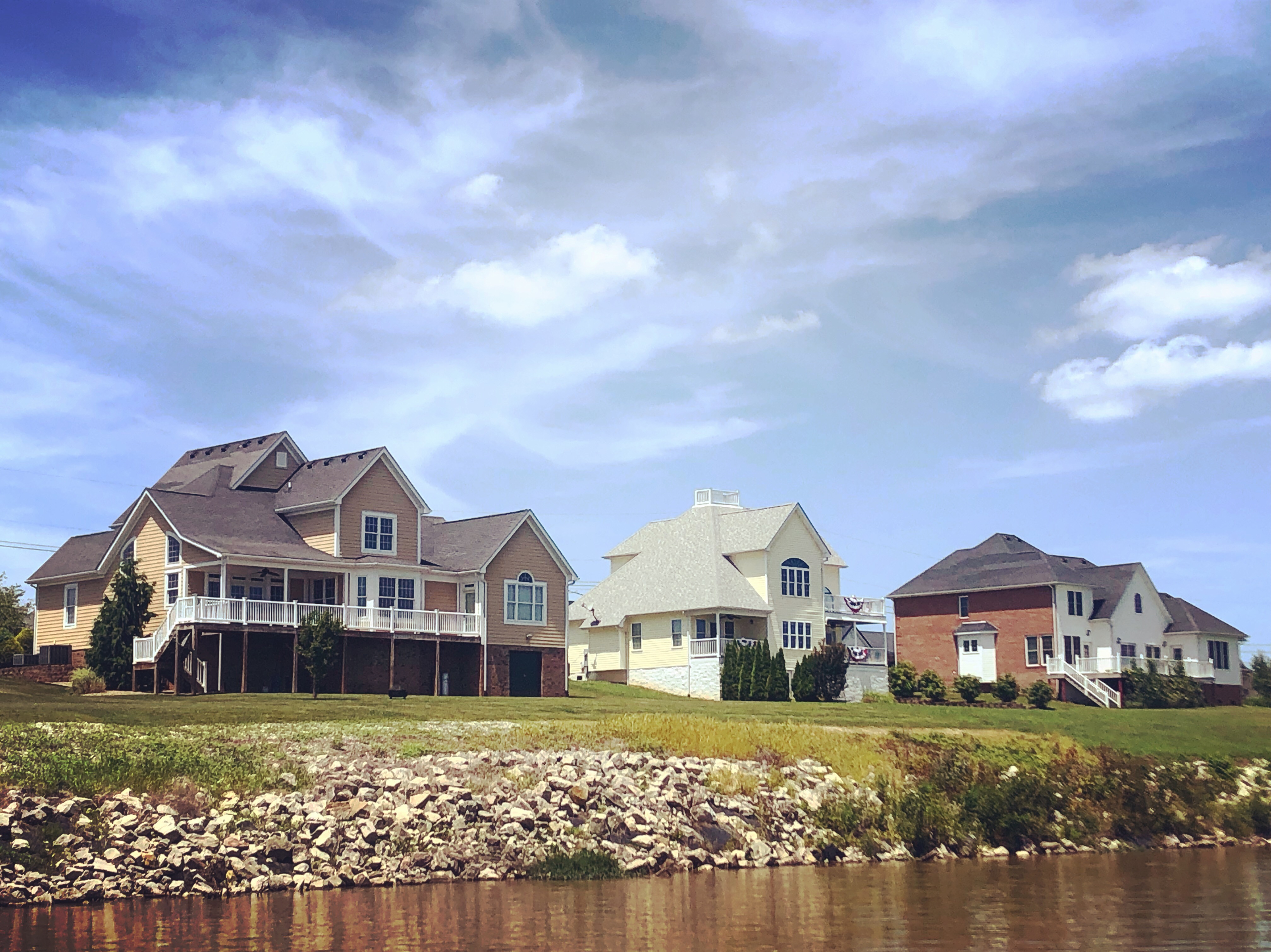 Who wouldn’t want a luxury home beside the river?