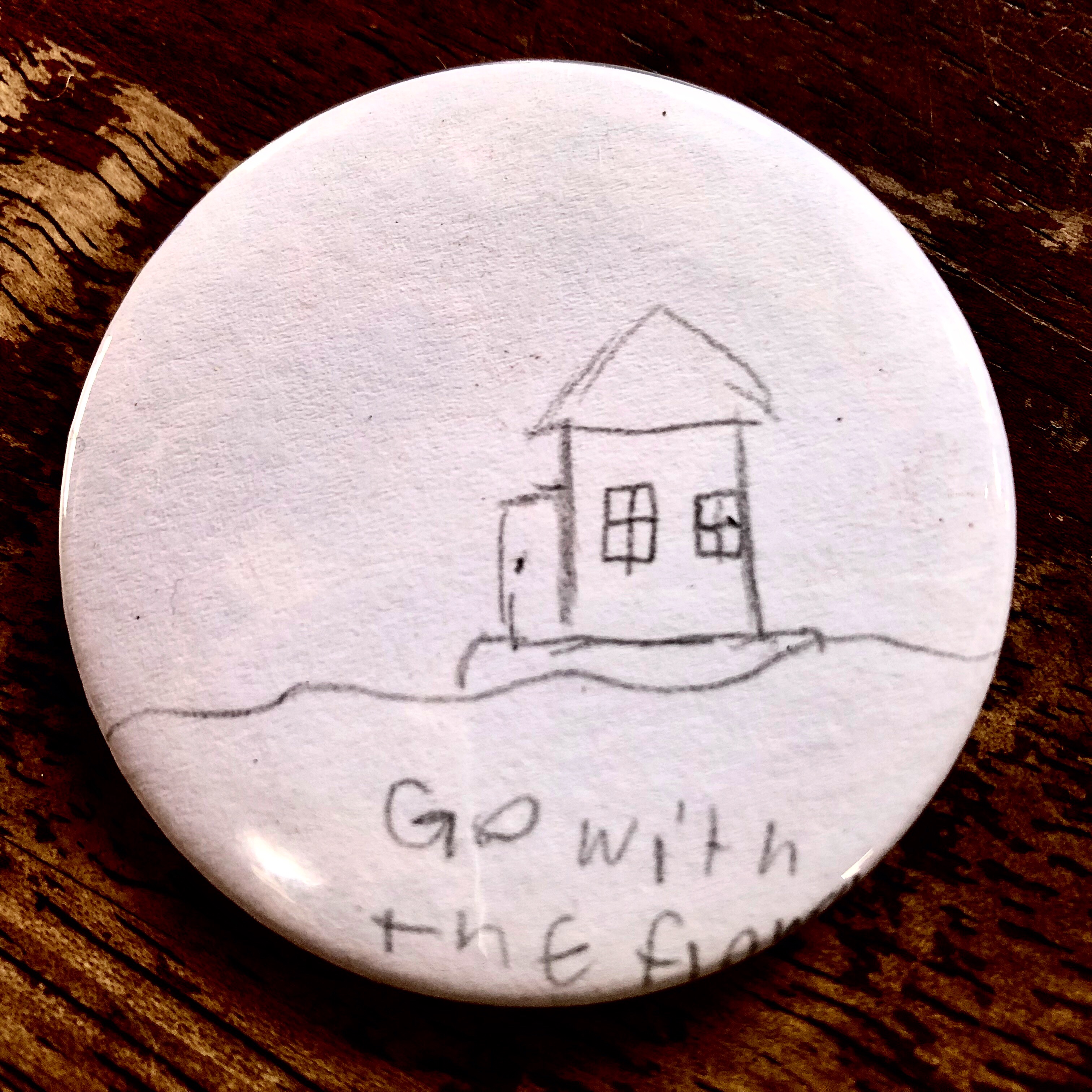 “Go with the flow” a button made by my new 10 year old friend Iris